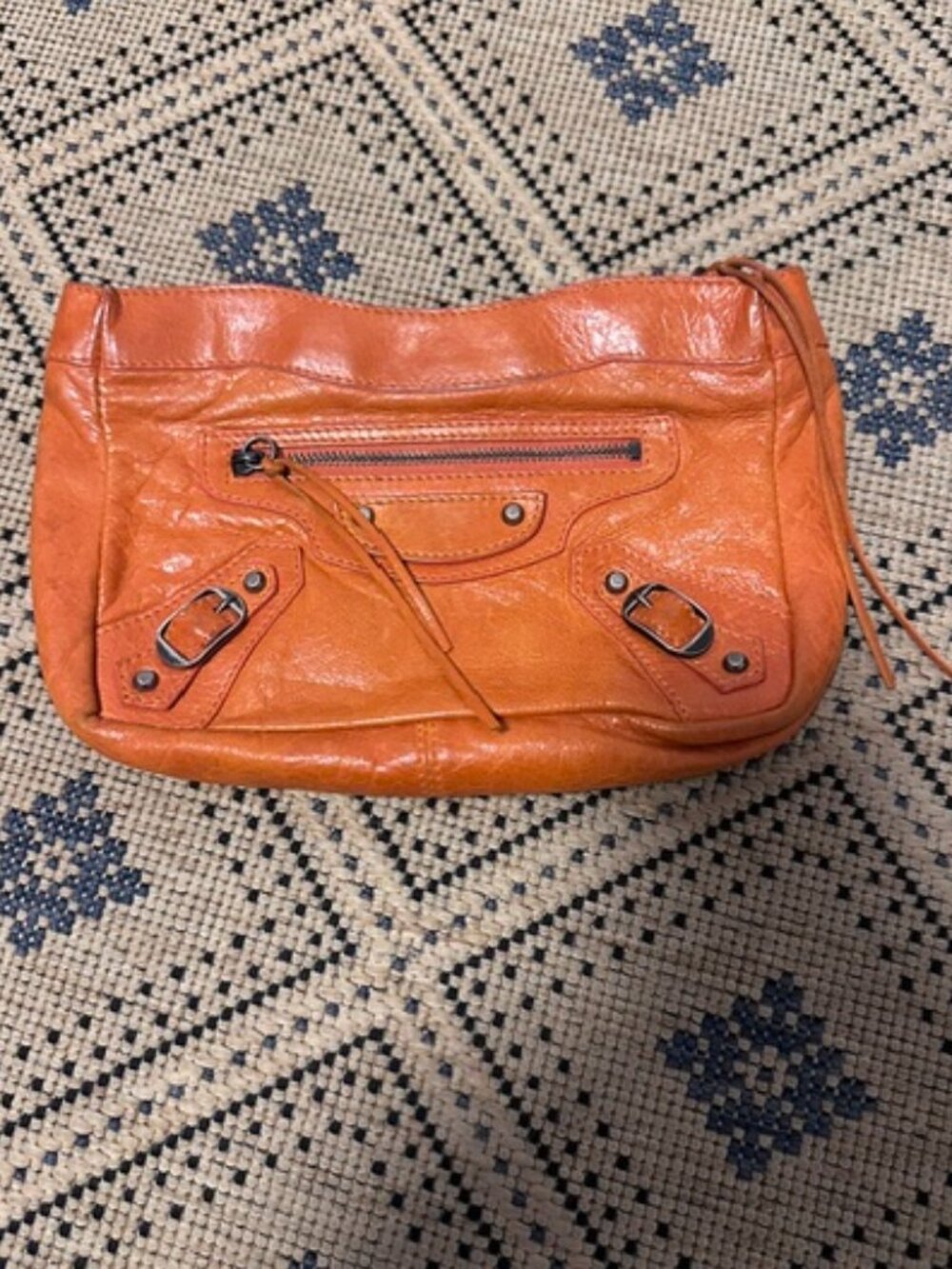 Balenciaga orange lambskin clutch